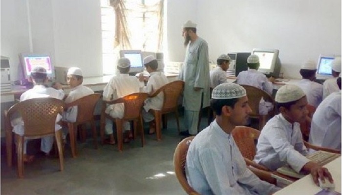 Students learning computer skills at Haji Langa Education Trust